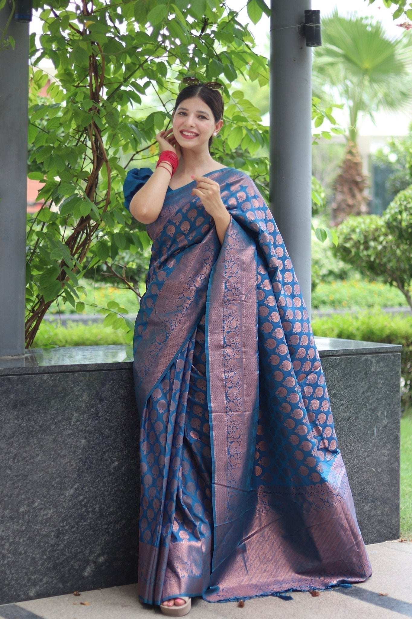 Kuber Pattu Silk Saree, Exuding Regal Charm With Its Rich Pallu And Intricate Brocade Blouse, Elegantly Adorned With Enchanting Tassels On The Saree's Edge. - Almaari Fashion