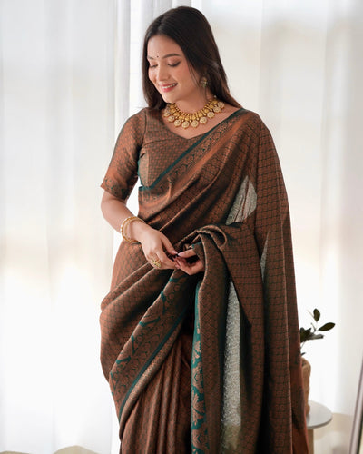 Kuber Pattu Silk Saree, Exuding Regal Charm With Its Rich Pallu And Intricate Brocade Blouse, Elegantly Adorned With Enchanting Tassels On The Saree's Edge. - Almaari Fashion