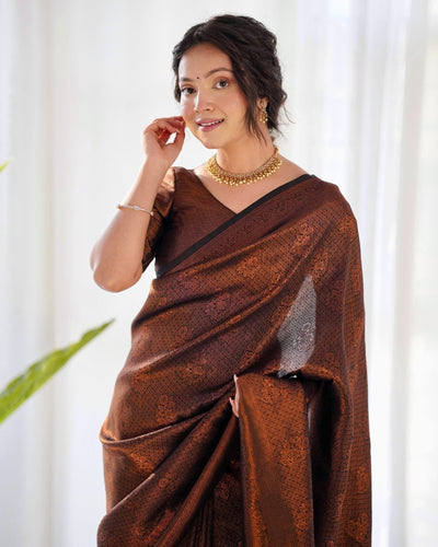 Kuber Pattu Silk Saree, Exuding Regal Charm With Its Rich Pallu And Intricate Brocade Blouse, Elegantly Adorned With Enchanting Tassels On The Saree's Edge. - Almaari Fashion