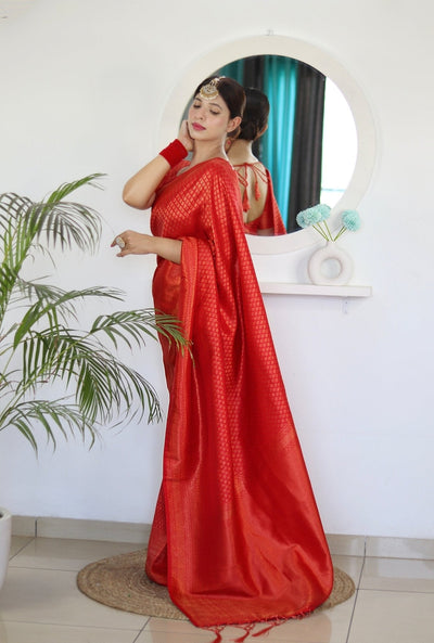 Kuber Pattu Silk Saree, Exuding Regal Charm With Its Rich Pallu And Intricate Brocade Blouse, Elegantly Adorned With Enchanting Tassels On The Saree's Edge. - Almaari Fashion