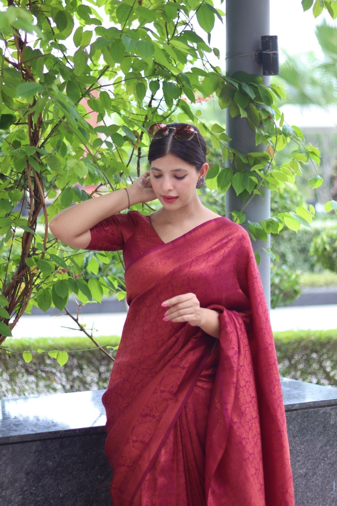 Kuber Pattu Silk Saree, Exuding Regal Charm With Its Rich Pallu And Intricate Brocade Blouse, Elegantly Adorned With Enchanting Tassels On The Saree's Edge. - Almaari Fashion