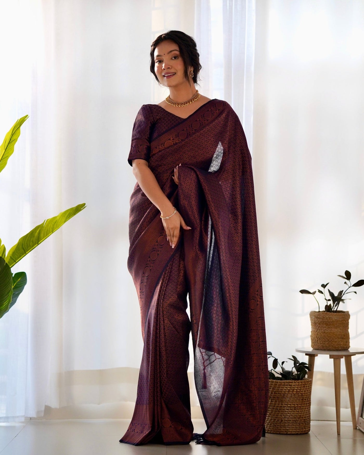 Kuber Pattu Silk Saree, Exuding Regal Charm With Its Rich Pallu And Intricate Brocade Blouse, Elegantly Adorned With Enchanting Tassels On The Saree's Edge. - Almaari Fashion