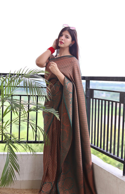 Kuber Pattu Silk Saree, Exuding Regal Charm With Its Rich Pallu And Intricate Brocade Blouse, Elegantly Adorned With Enchanting Tassels On The Saree's Edge. - Almaari Fashion