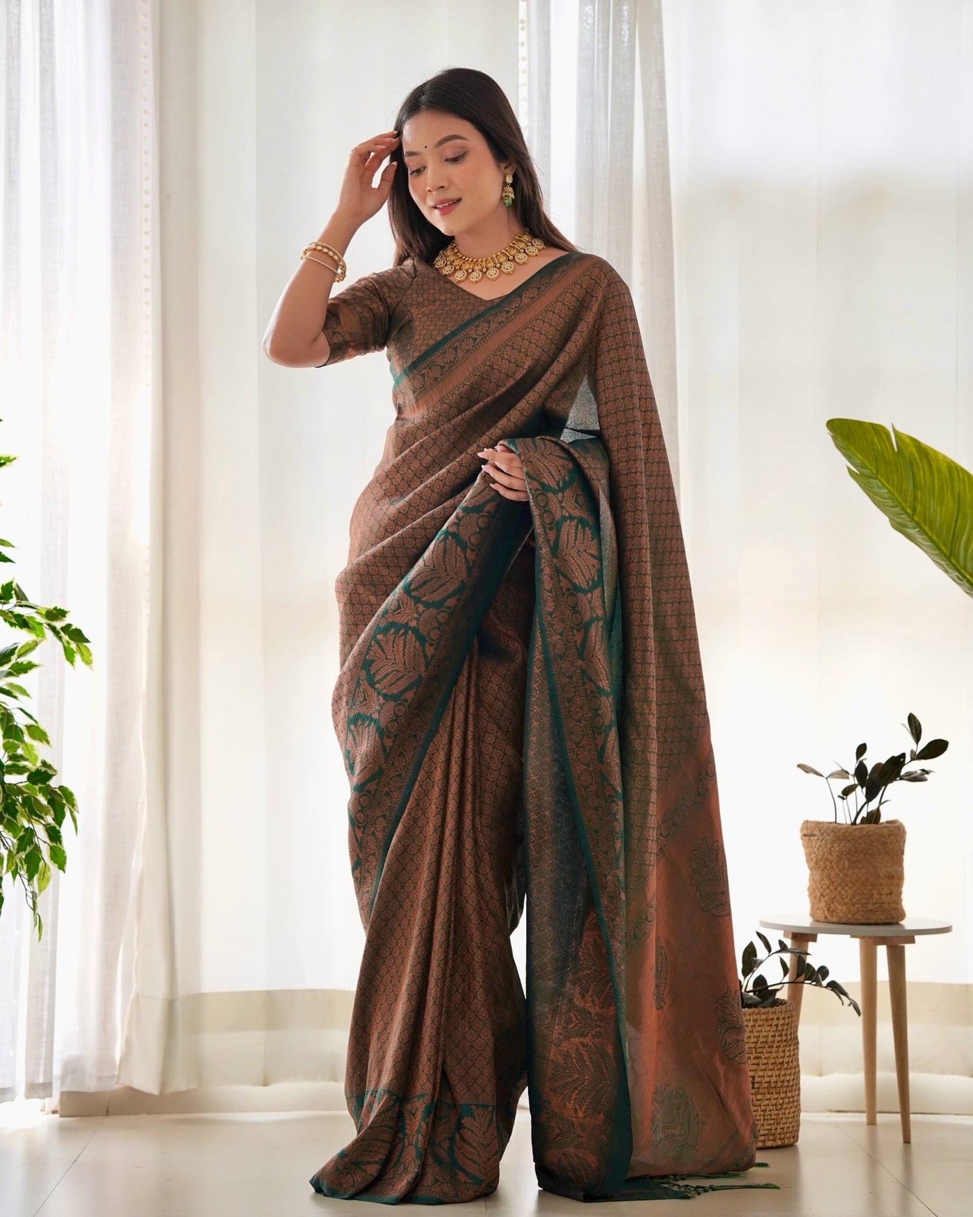 Kuber Pattu Silk Saree, Exuding Regal Charm With Its Rich Pallu And Intricate Brocade Blouse, Elegantly Adorned With Enchanting Tassels On The Saree's Edge. - Almaari Fashion