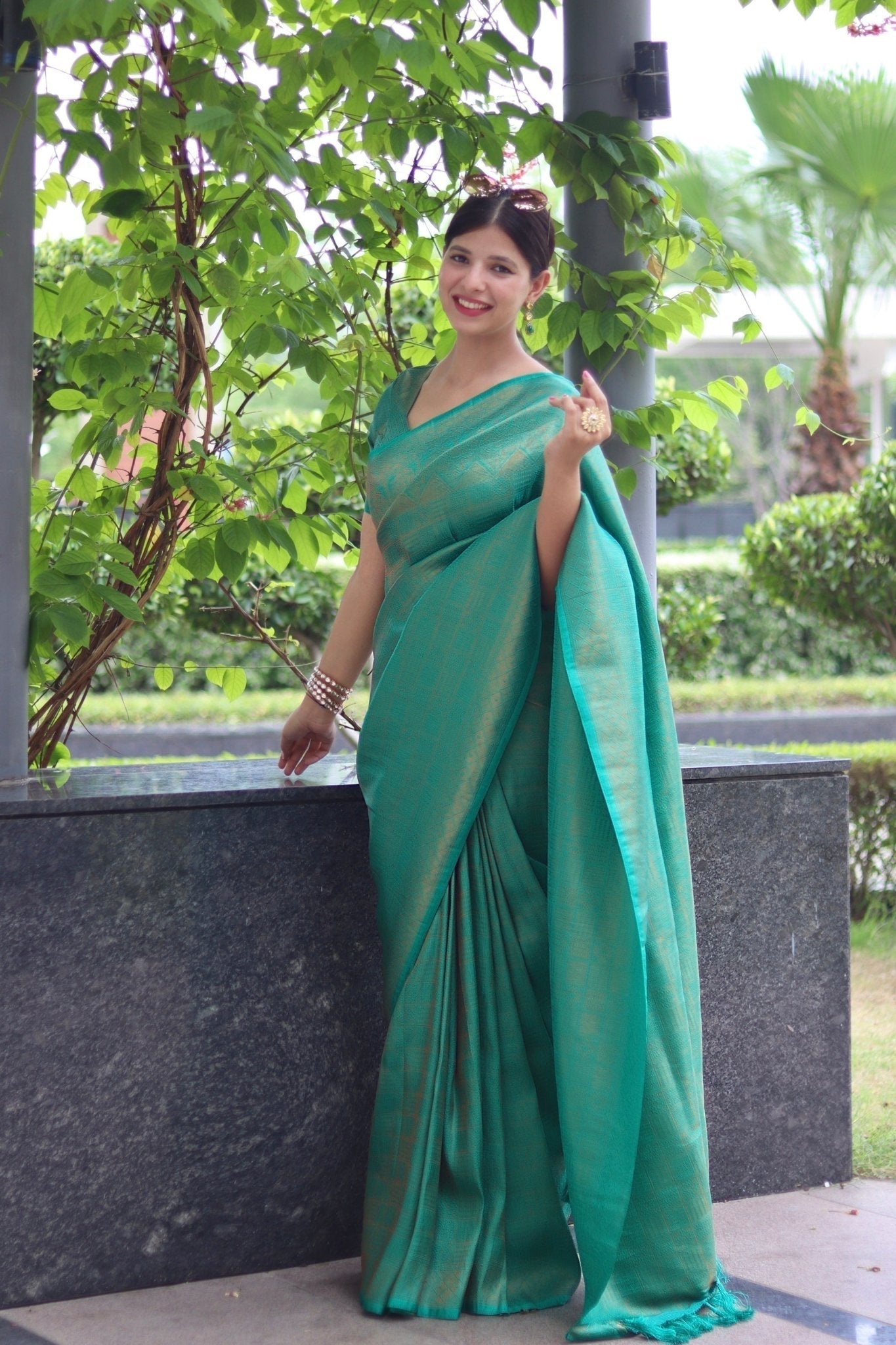 Kuber Pattu Silk Saree, Exuding Regal Charm With Its Rich Pallu And Intricate Brocade Blouse, Elegantly Adorned With Enchanting Tassels On The Saree's Edge. - Almaari Fashion