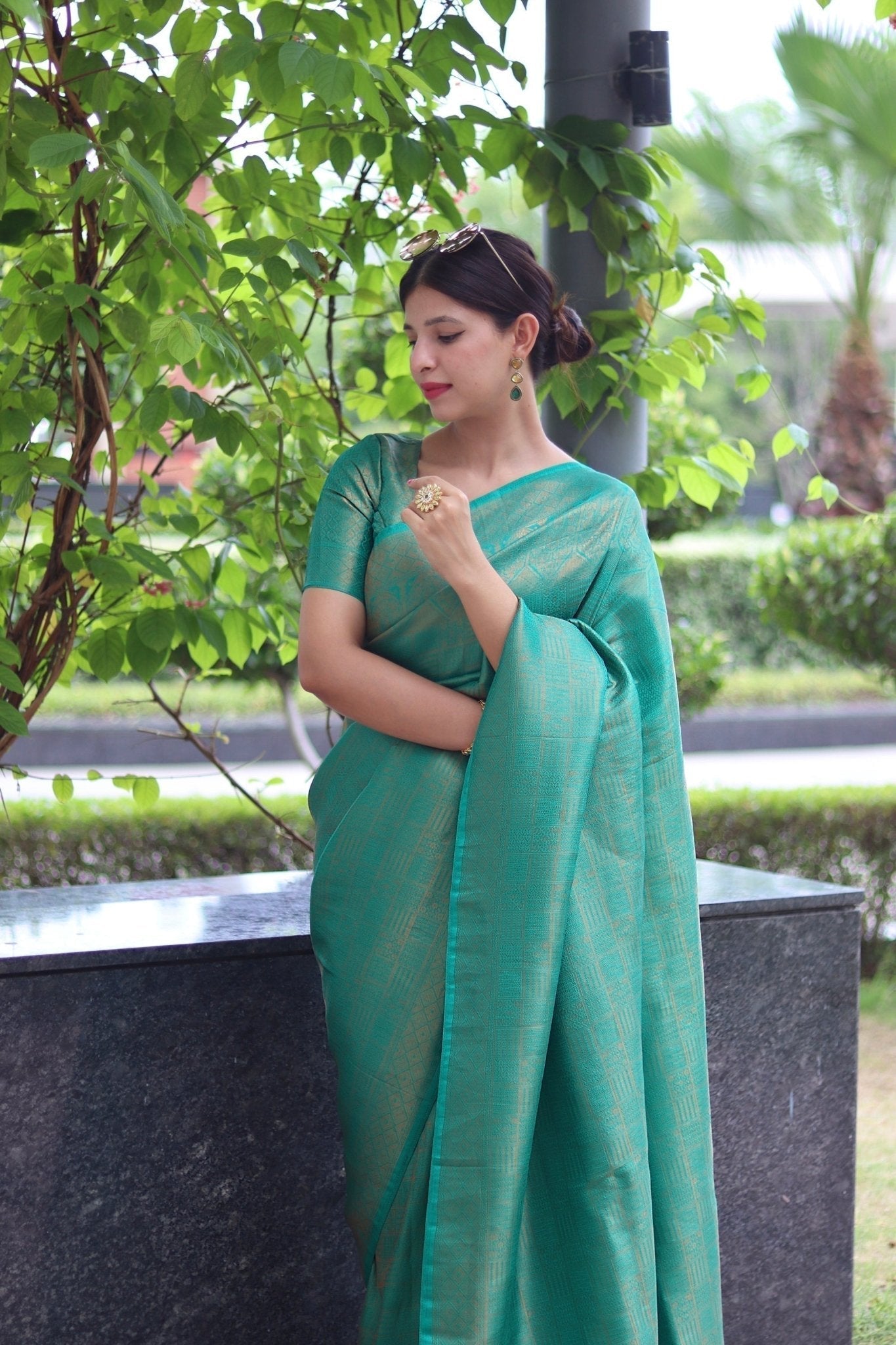 Kuber Pattu Silk Saree, Exuding Regal Charm With Its Rich Pallu And Intricate Brocade Blouse, Elegantly Adorned With Enchanting Tassels On The Saree's Edge. - Almaari Fashion