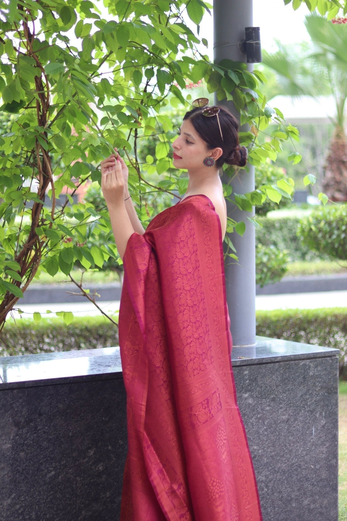 Kuber Pattu Silk Saree, Exuding Regal Charm With Its Rich Pallu And Intricate Brocade Blouse, Elegantly Adorned With Enchanting Tassels On The Saree's Edge. - Almaari Fashion