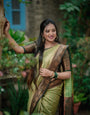 Light Green Pure Kanjivaram Silk Saree With Engrossing Maroon Blouse Piece