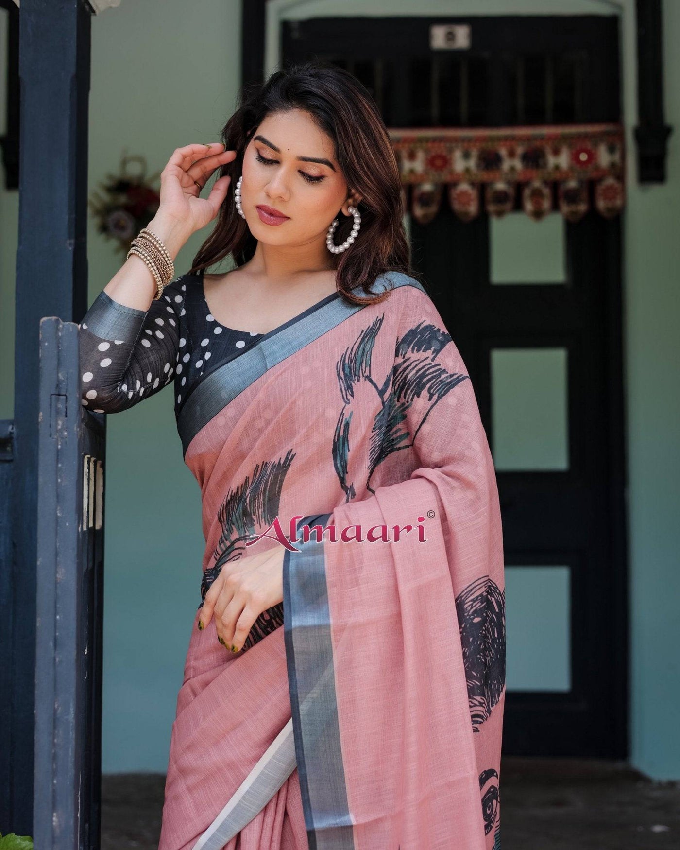 Blush Pink Pure Cotton Linen Saree with Contrast Polka Dot Blouse and Tassel Detailing