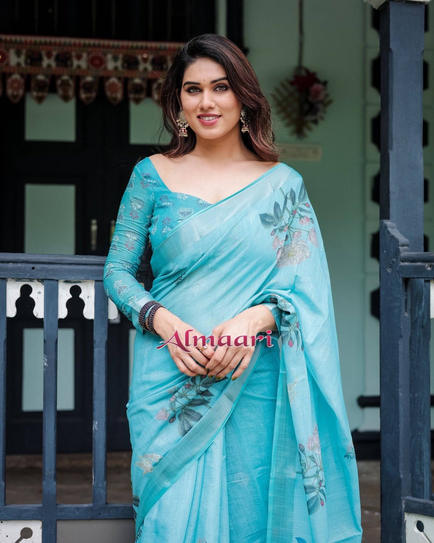 Aqua Blue Pure Cotton Linen Saree with Floral Design Blouse and Tassel Detailing