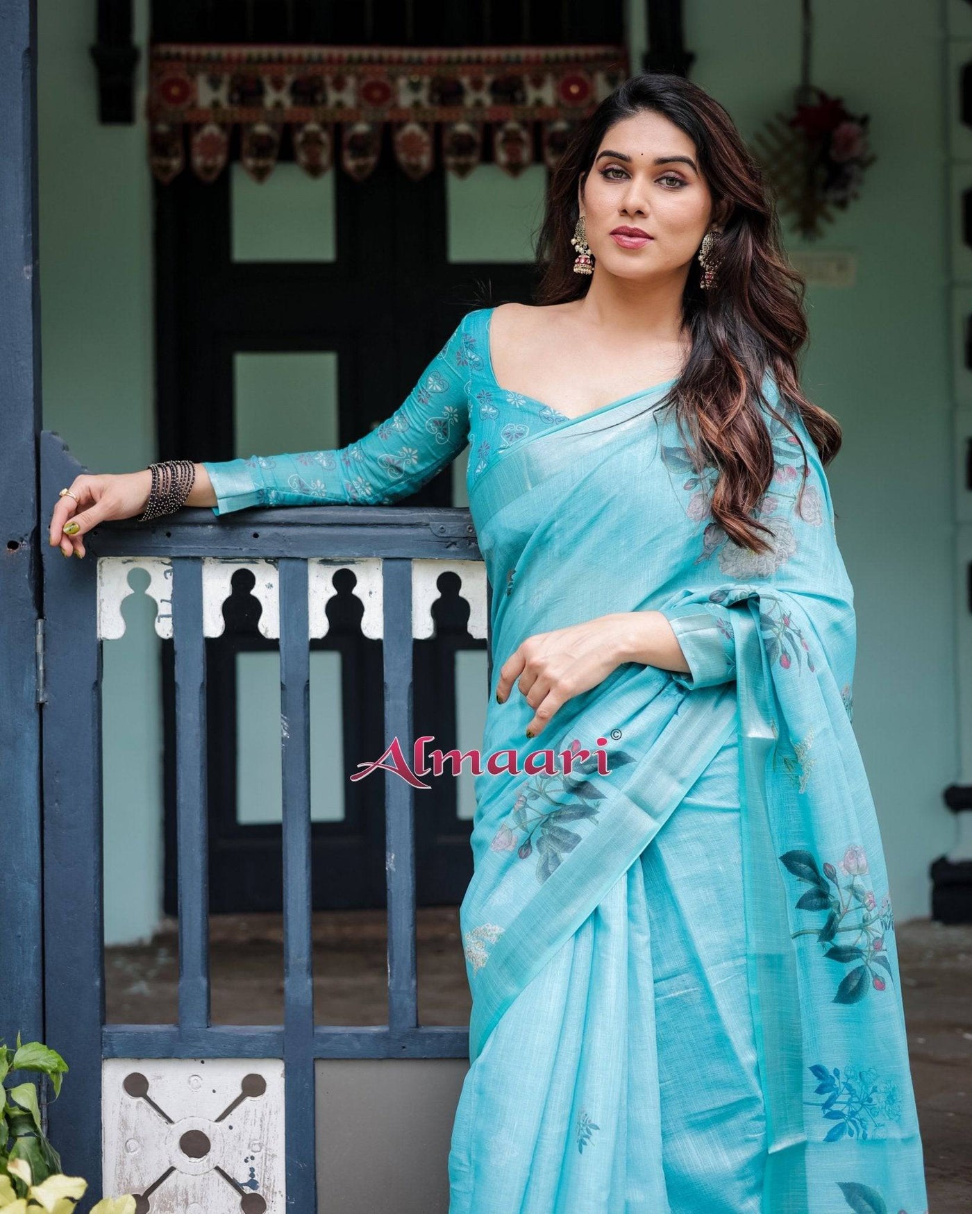 Aqua Blue Pure Cotton Linen Saree with Floral Design, Blouse, and Tassel Detailing