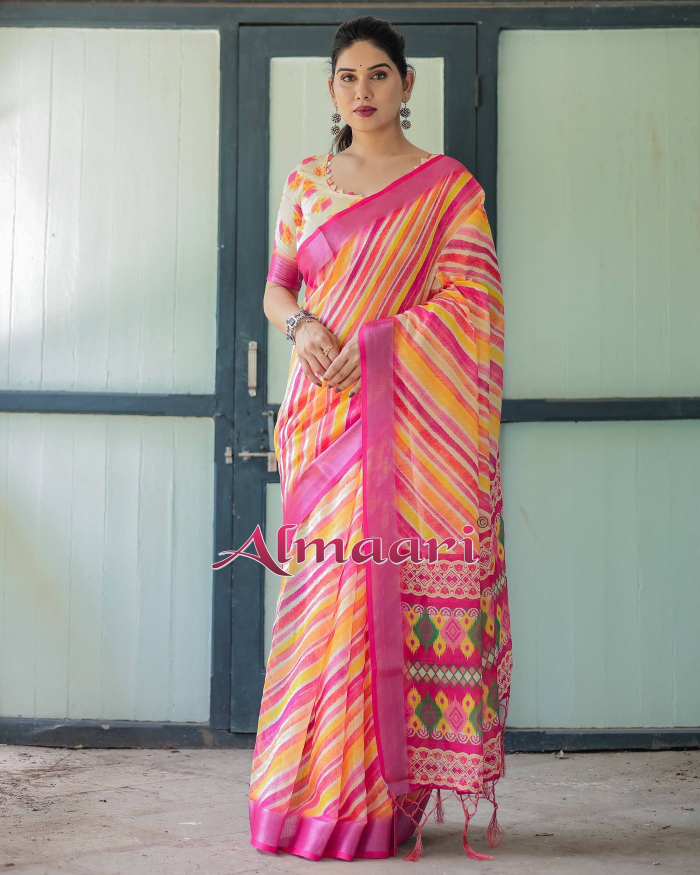 Vibrant Yellow and Pink Ikat Printed Cotton Linen Saree with Blouse and Tassels