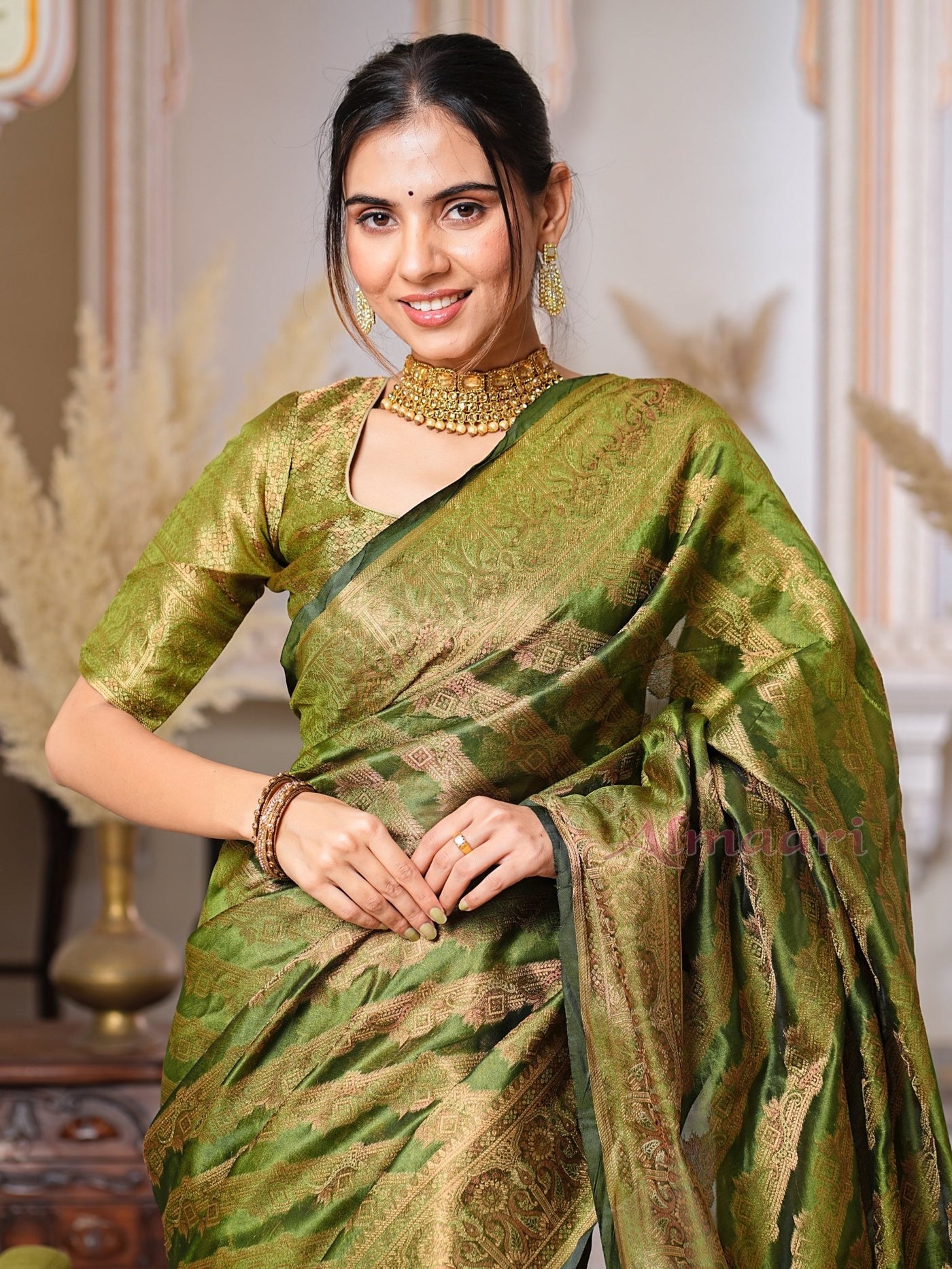 Mehandi Green Color Pure Organza Saree Adorned with Zari Weaving, Complete with Matching Blouse Piece - Almaari Fashion