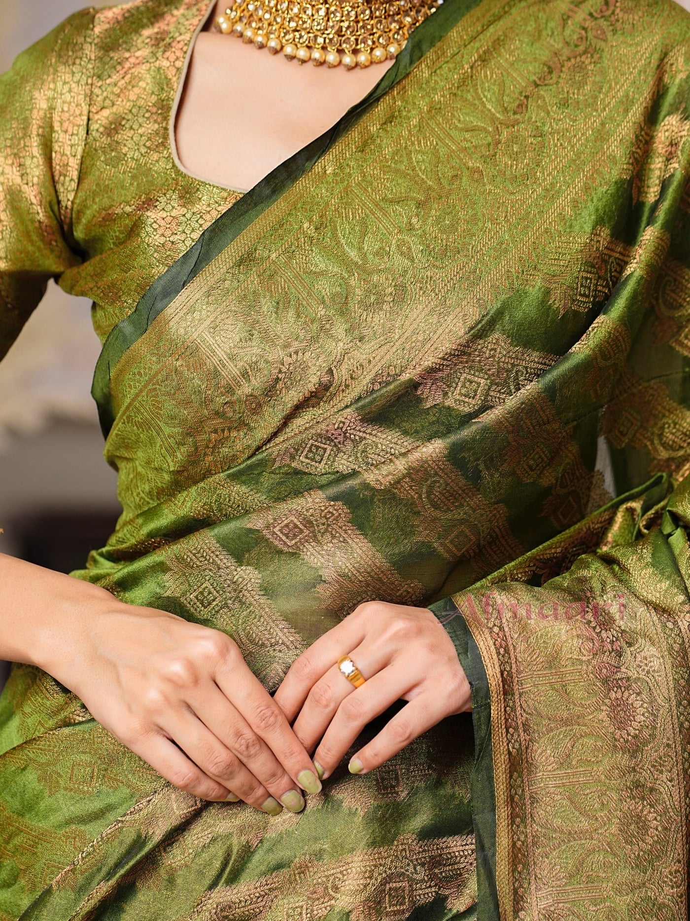 Mehandi Green Color Pure Organza Saree Adorned with Zari Weaving, Complete with Matching Blouse Piece - Almaari Fashion