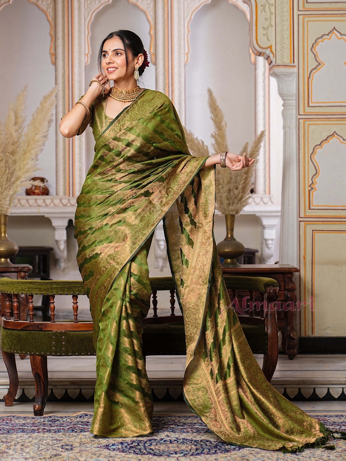 Mehandi Green Color Pure Organza Saree Adorned with Zari Weaving, Complete with Matching Blouse Piece - Almaari Fashion