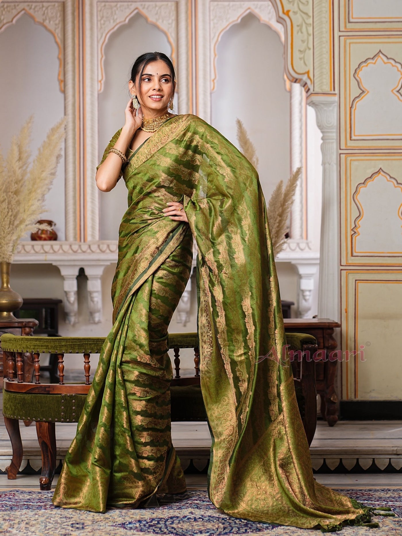 Mehandi Green Color Pure Organza Saree Adorned with Zari Weaving, Complete with Matching Blouse Piece - Almaari Fashion