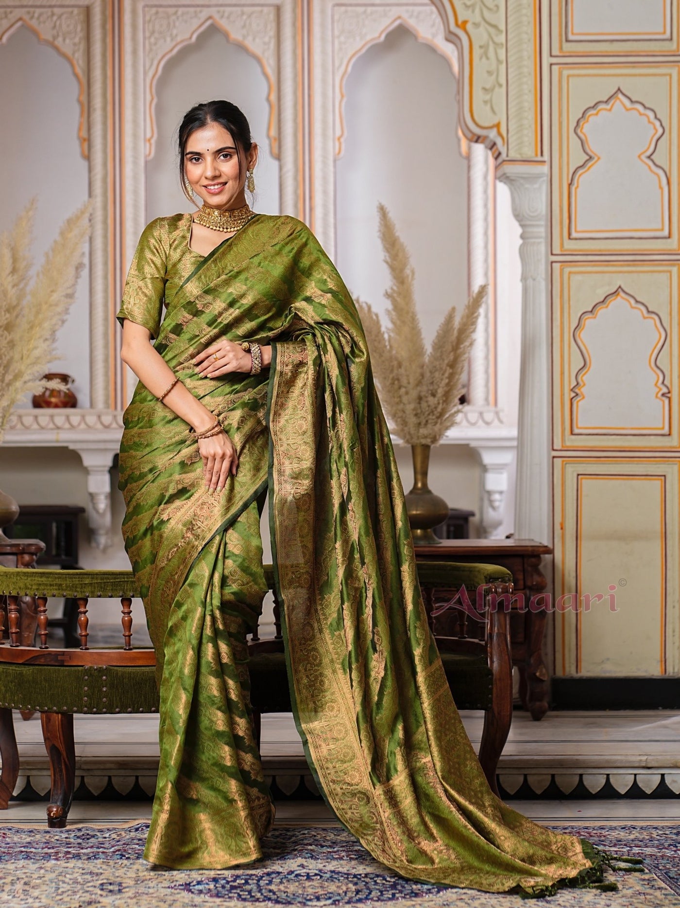 Mehandi Green Color Pure Organza Saree Adorned with Zari Weaving, Complete with Matching Blouse Piece - Almaari Fashion
