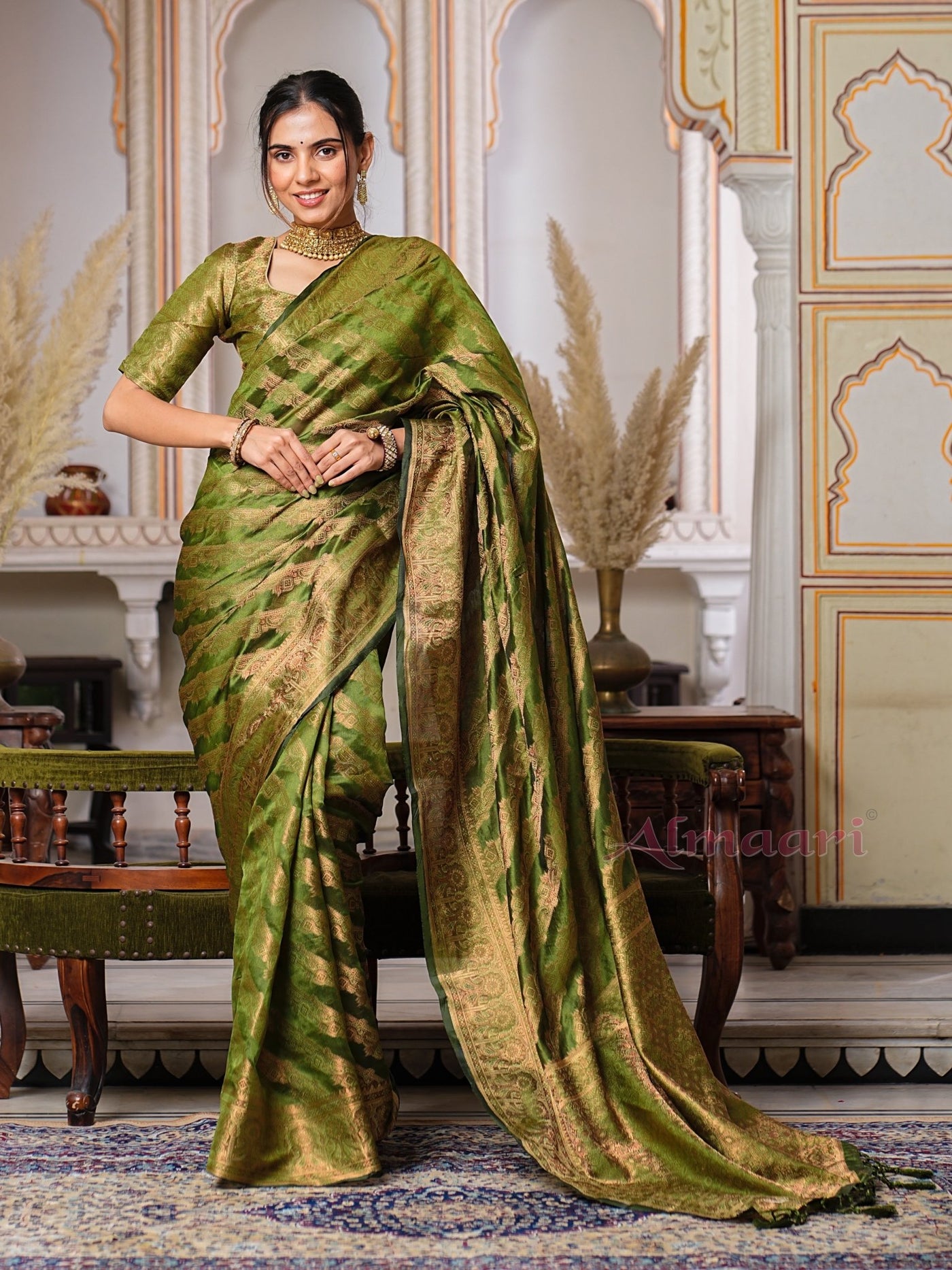 Mehandi Green Color Pure Organza Saree Adorned with Zari Weaving, Complete with Matching Blouse Piece - Almaari Fashion