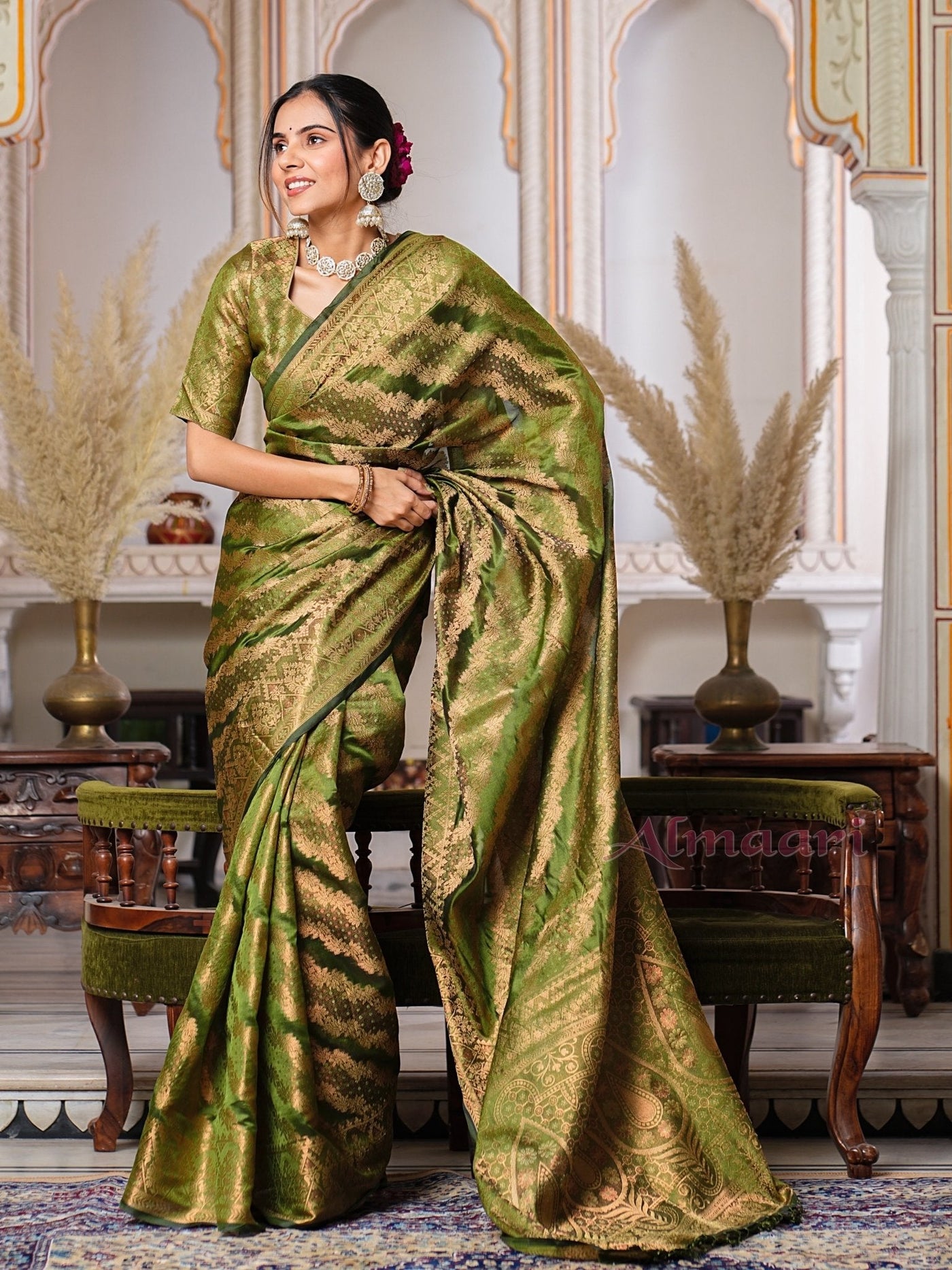 Mehandi GreenColor Pure Organza Saree Adorned with Zari Weaving, Complete with Matching Blouse Piece - Almaari Fashion