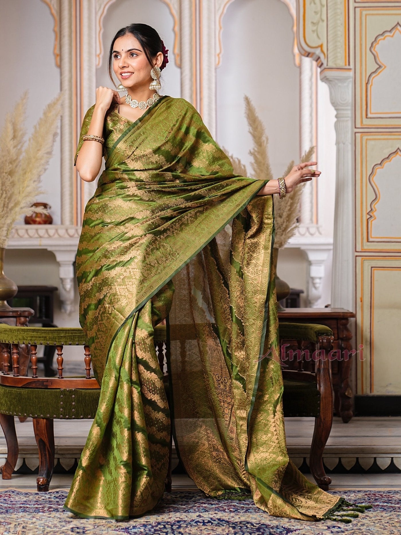 Mehandi GreenColor Pure Organza Saree Adorned with Zari Weaving, Complete with Matching Blouse Piece - Almaari Fashion