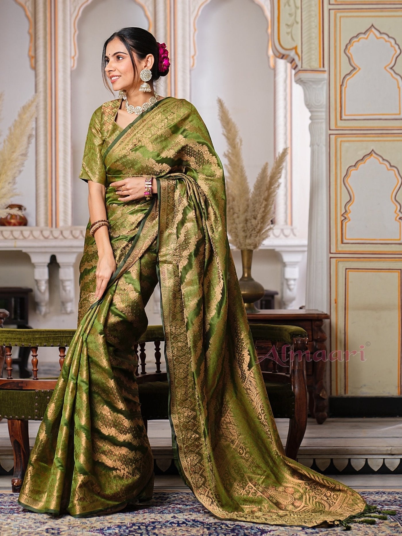 Mehandi GreenColor Pure Organza Saree Adorned with Zari Weaving, Complete with Matching Blouse Piece - Almaari Fashion