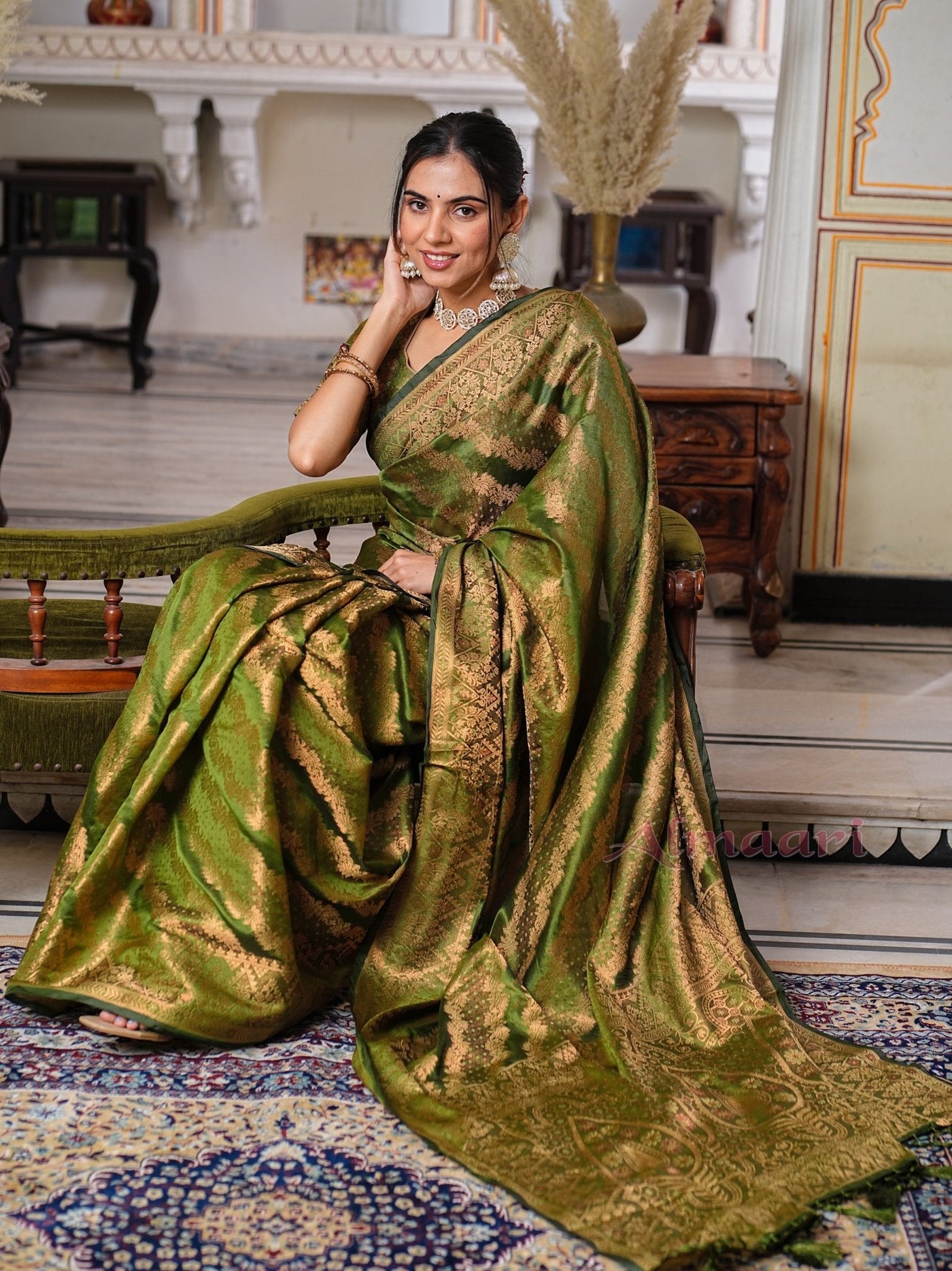 Mehandi GreenColor Pure Organza Saree Adorned with Zari Weaving, Complete with Matching Blouse Piece - Almaari Fashion