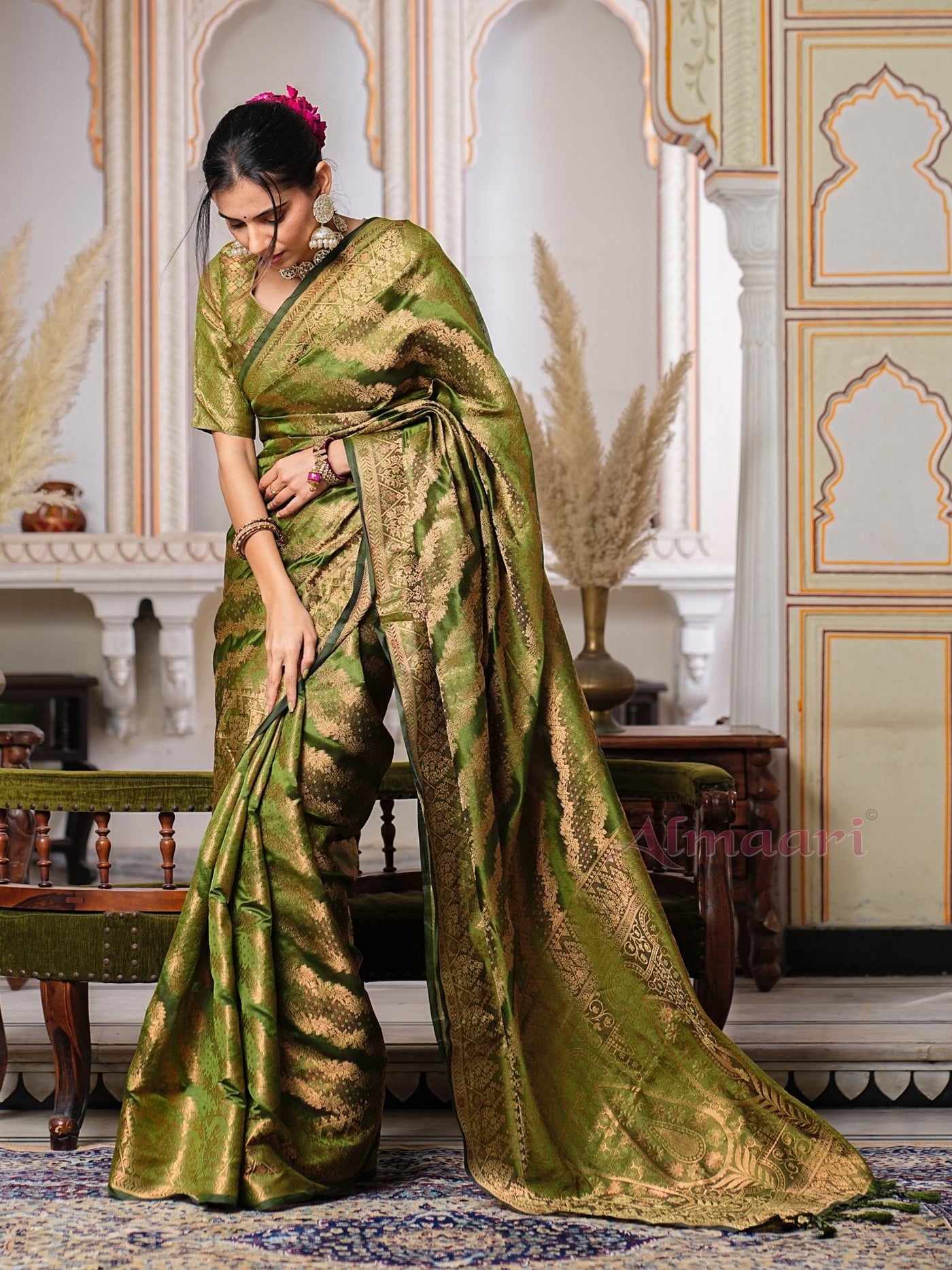 Mehandi GreenColor Pure Organza Saree Adorned with Zari Weaving, Complete with Matching Blouse Piece - Almaari Fashion