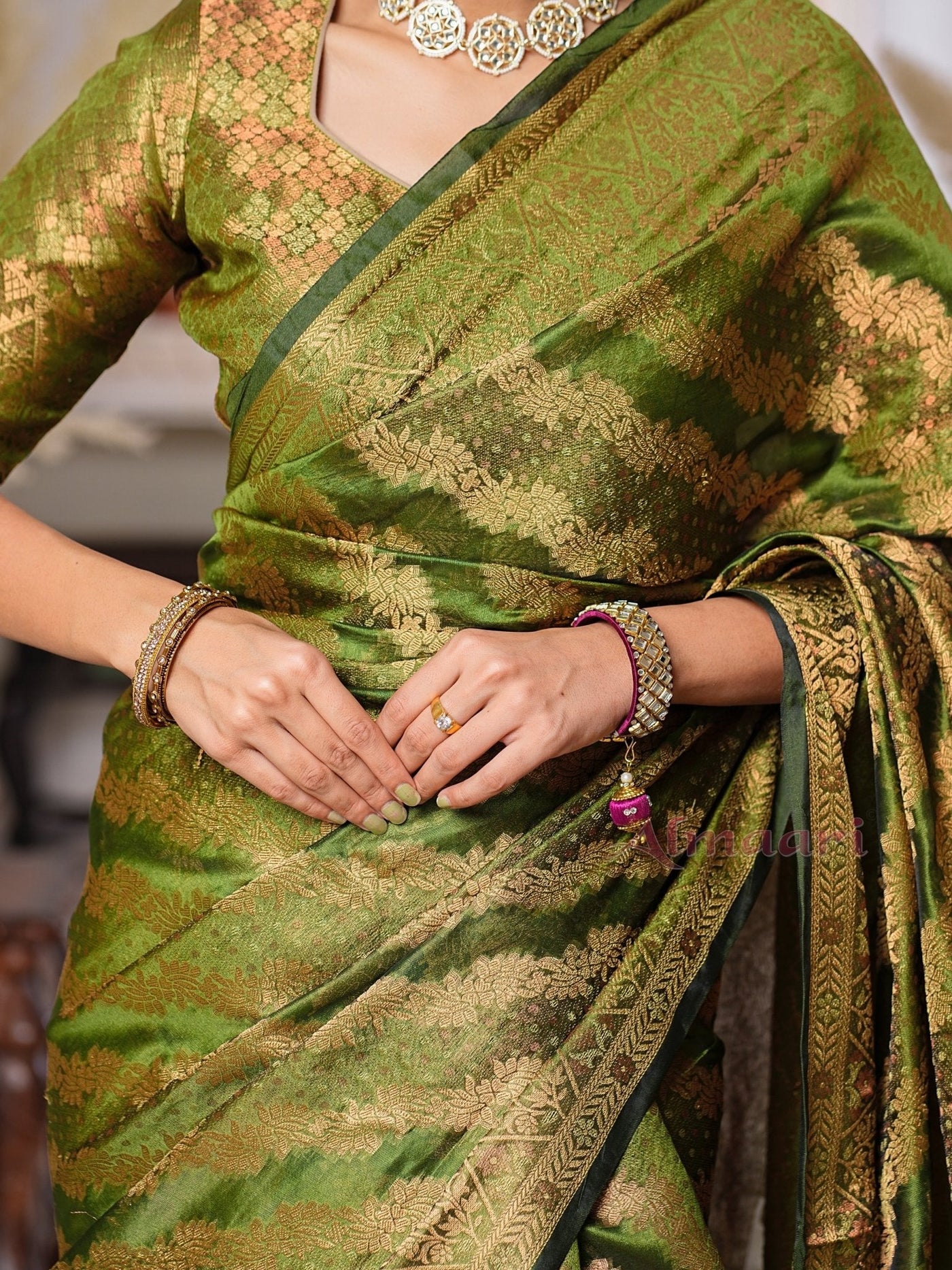 Mehandi GreenColor Pure Organza Saree Adorned with Zari Weaving, Complete with Matching Blouse Piece - Almaari Fashion