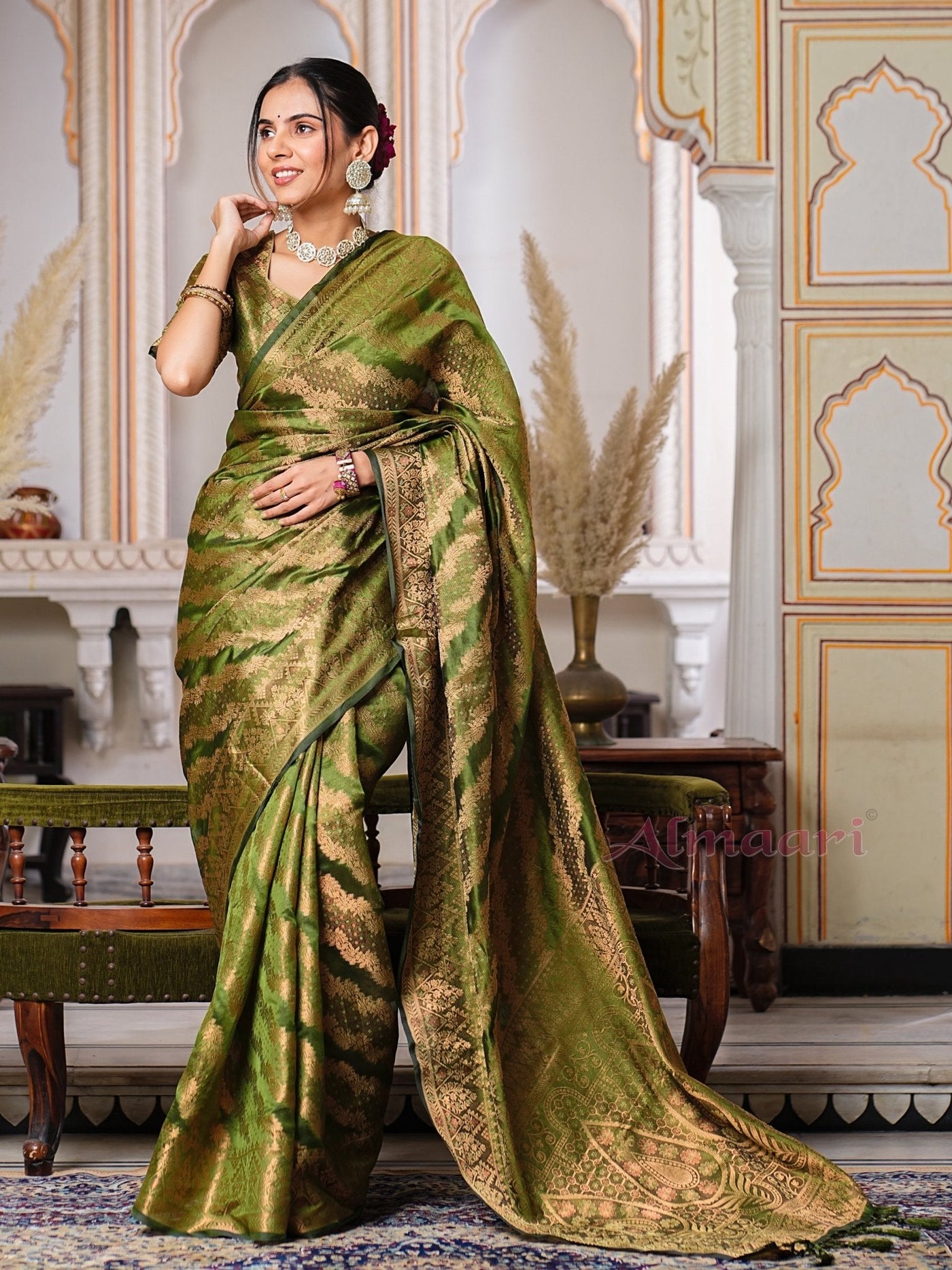 Mehandi GreenColor Pure Organza Saree Adorned with Zari Weaving, Complete with Matching Blouse Piece - Almaari Fashion