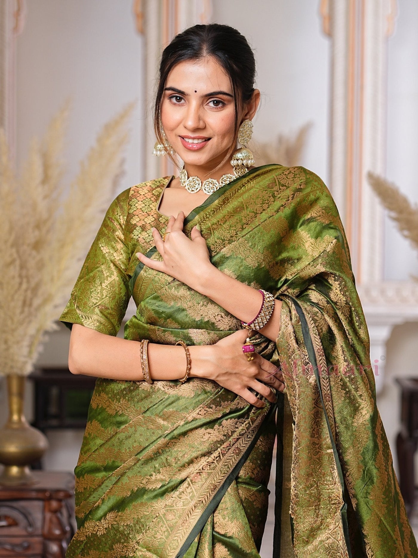 Mehandi GreenColor Pure Organza Saree Adorned with Zari Weaving, Complete with Matching Blouse Piece - Almaari Fashion