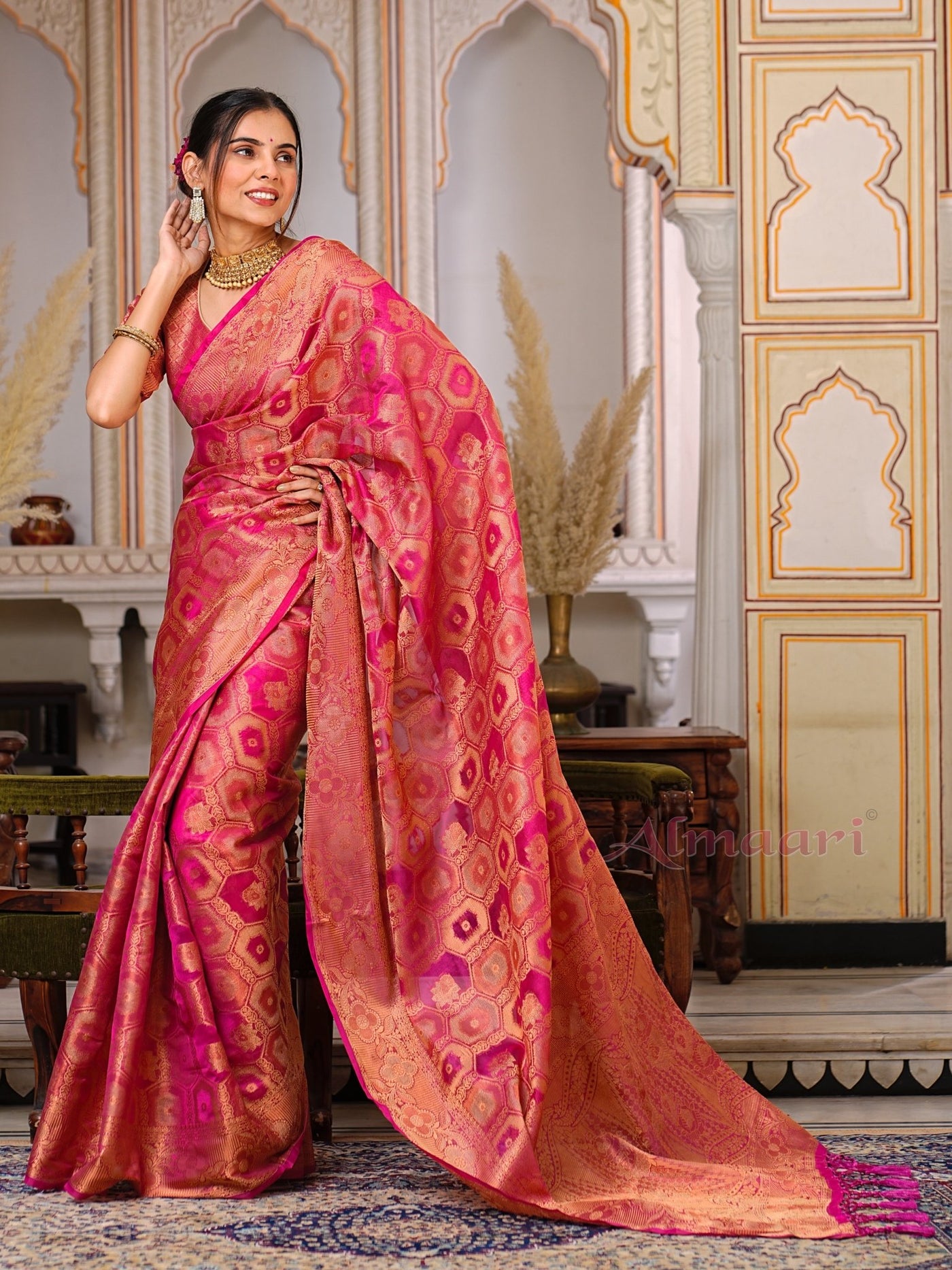 Peach Color Pure Organza Saree Adorned with Zari Weaving, Complete with Matching Blouse Piece - Almaari Fashion