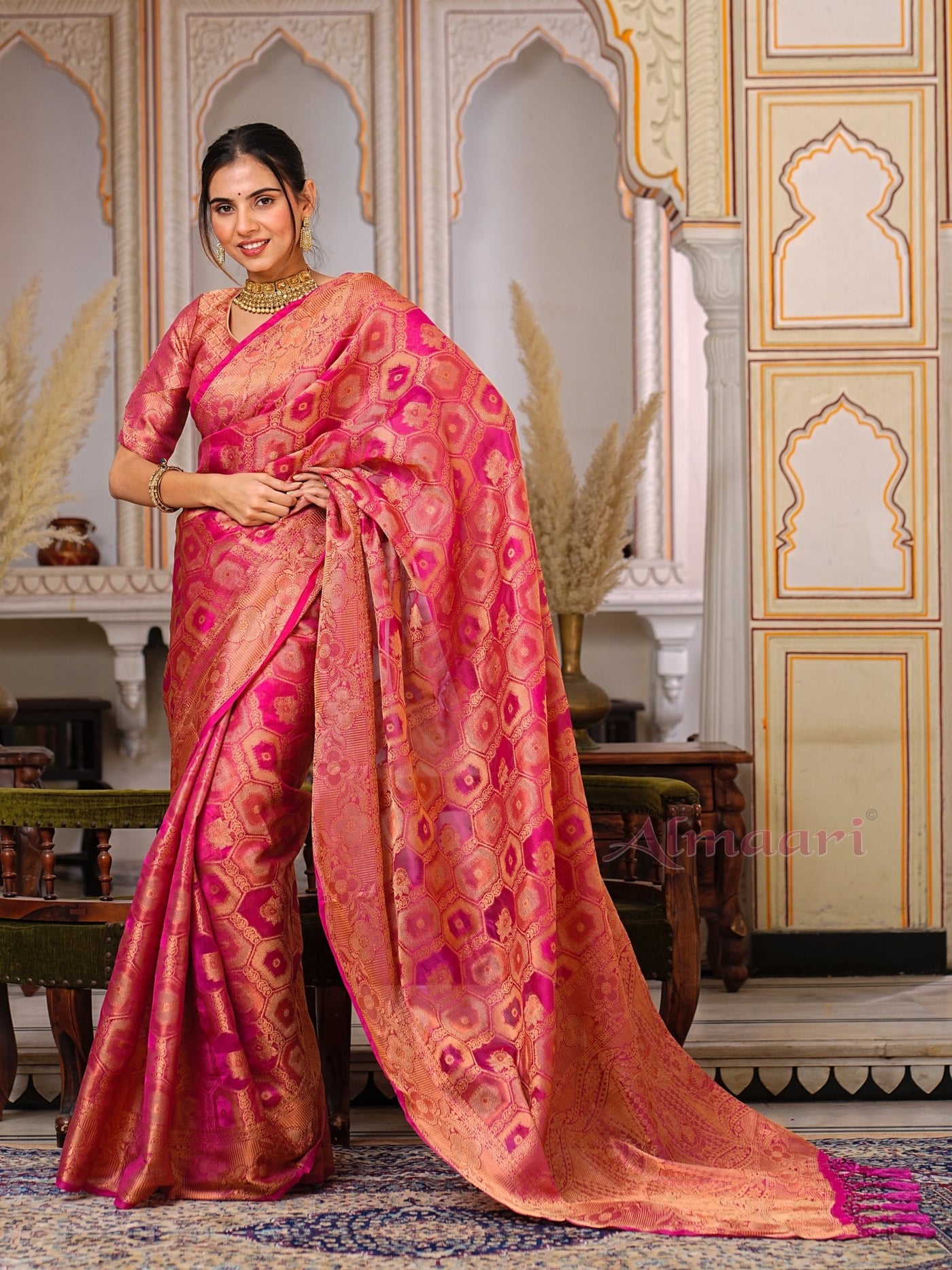 Peach Color Pure Organza Saree Adorned with Zari Weaving, Complete with Matching Blouse Piece - Almaari Fashion