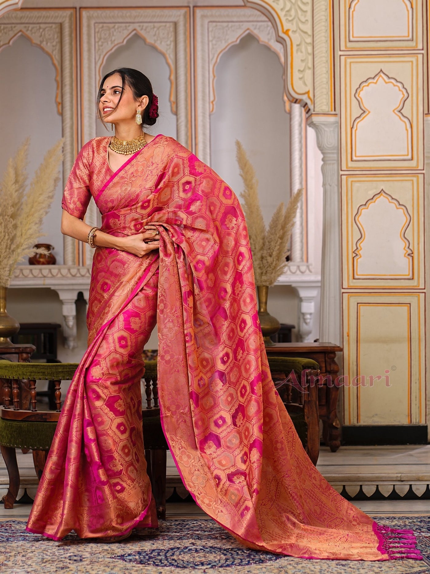 Peach Color Pure Organza Saree Adorned with Zari Weaving, Complete with Matching Blouse Piece - Almaari Fashion