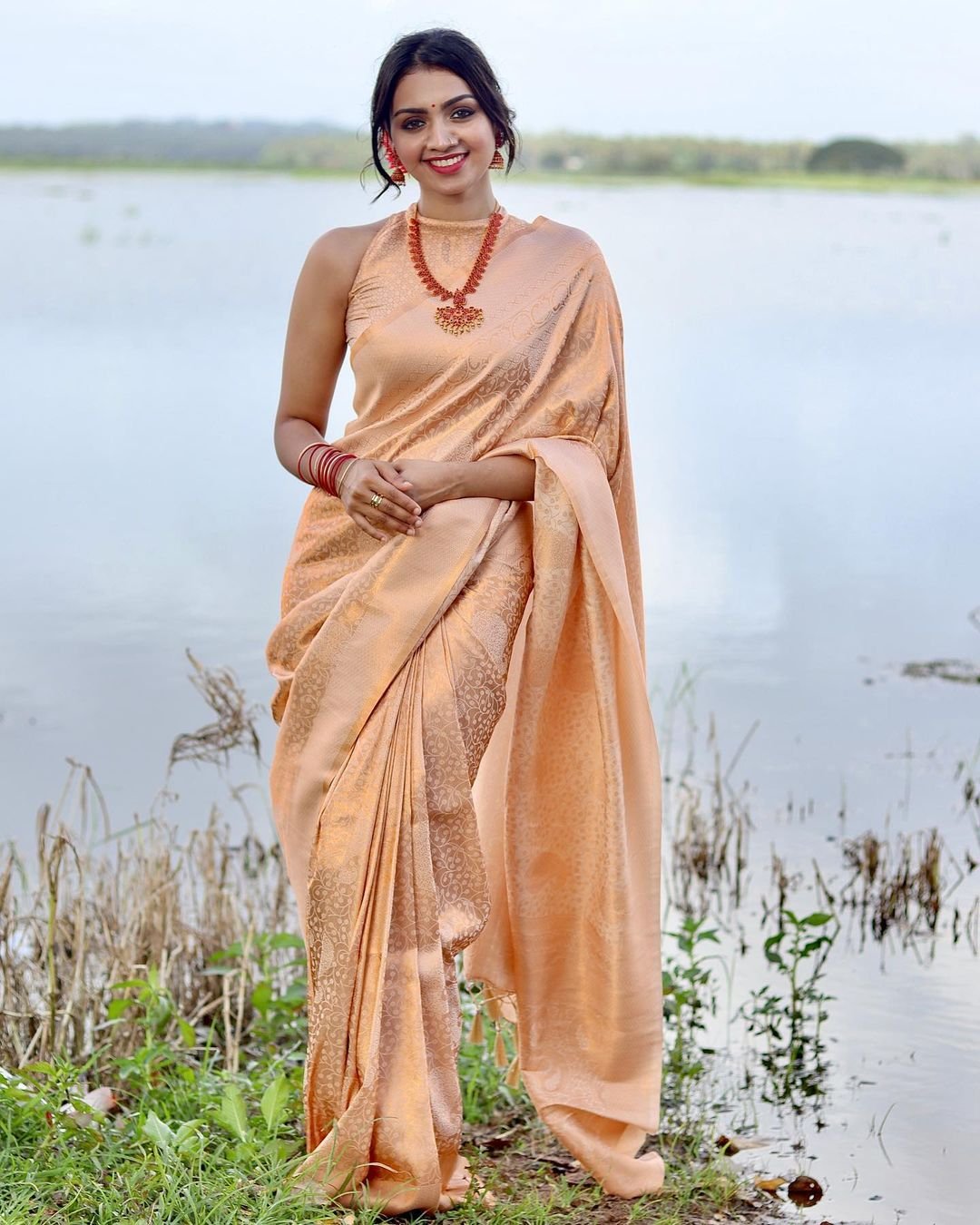 Phenomenal Light Orange Soft Banarasi Silk Saree With Imbrication Blouse Piece - Almaari Fashion