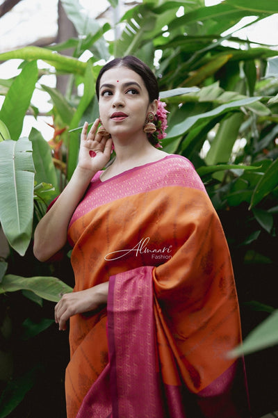 Phenomenal Orange Soft Silk Saree Weaved With Copper Zari With Imbrication Blouse Piece - Almaari Fashion