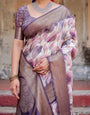 Elegant Purple Floral Banarasi Silk Saree with Intricate Zari Weave and Tassels