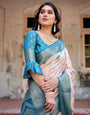 Peach and Teal Floral Digital Print Banarasi Silk Saree with Zari Weave and Tassel-Adorned Pallu