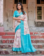 White and Aqua Floral Design Banarasi Silk Saree with Zari Weave and Tassel-Embellished Pallu