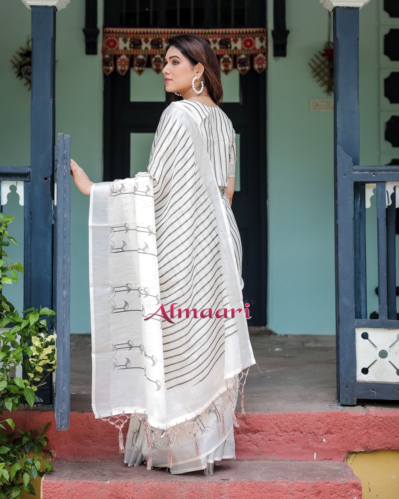 Pure Cotton Linen Saree Weaved With Zari Comes With Tassels - Almaari Fashion