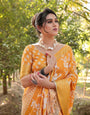 Sunshine Yellow Tussar Silk Saree with White Floral Motifs, Lustrous Zari Border, and Graceful Tassel Pallu