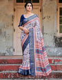 Ivory and Navy Blue Tussar Silk Saree with Floral Elegance and Ornamental Zari Work