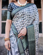 Monochrome White and Black Tussar Silk Saree with Tribal Art Motifs and Zari Border