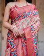 Beige and Coral Banarasi Silk Saree with Intricate Floral Prints and Artistic Pallu