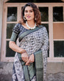 Monochrome White and Black Tussar Silk Saree with Tribal Art Motifs and Zari Border