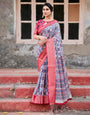 White and Red Tussar Silk Saree with Vibrant Floral Geometric Motifs and Ornamental Zari Border