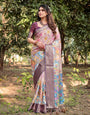 Pastel Beige Banarasi Silk Saree with Vibrant Floral Motifs and Zari Border