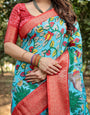 Aqua Blue Tussar Silk Saree with Vibrant Nature-Inspired Prints and Red Zari Border