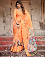 Sunset Orange Banarasi Silk Saree with Royal Procession Pallu and Zari Border