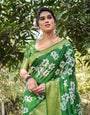 Enchanting Green Tussar Silk Saree with White Floral Prints and Zari Border