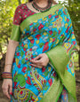 Vibrant Peacock Motif Blue and Green Tussar Silk Saree with Zari Border